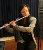 Flutist recording in Mirror Sound's Center Stage